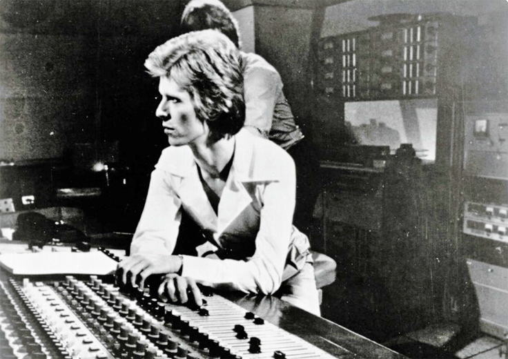 David Bowie with Ampex reel to reel tape recorder