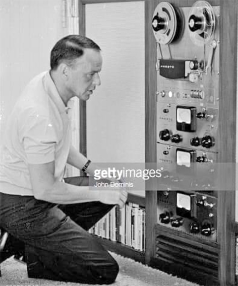 Frank Sinatra with Ampex reel tape recorders (a Getty Image)