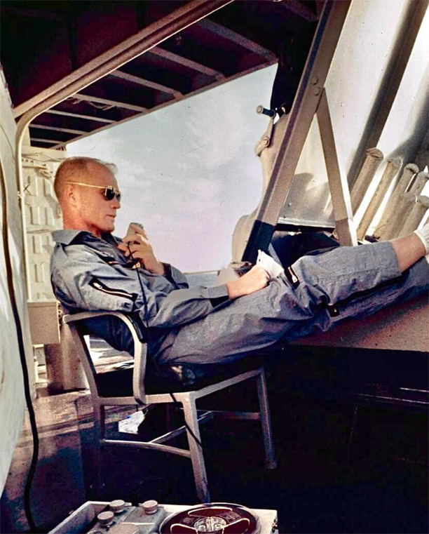 Astronaut John Glenn recording his mission on February 20, 1962