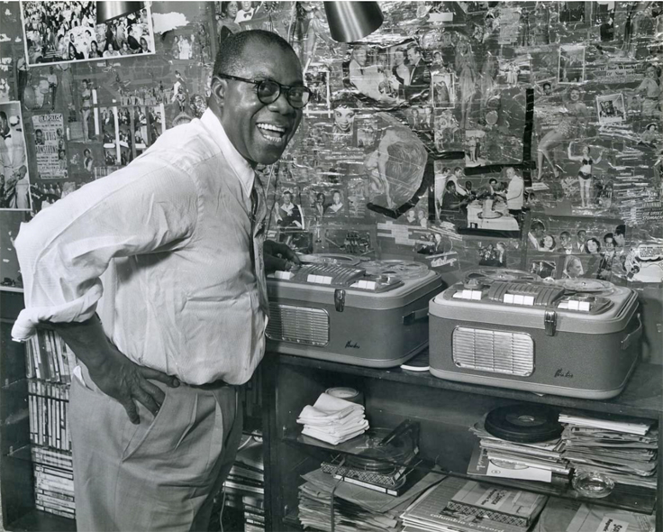 Louis Armstrong with Norelco reel to reel tape recorders